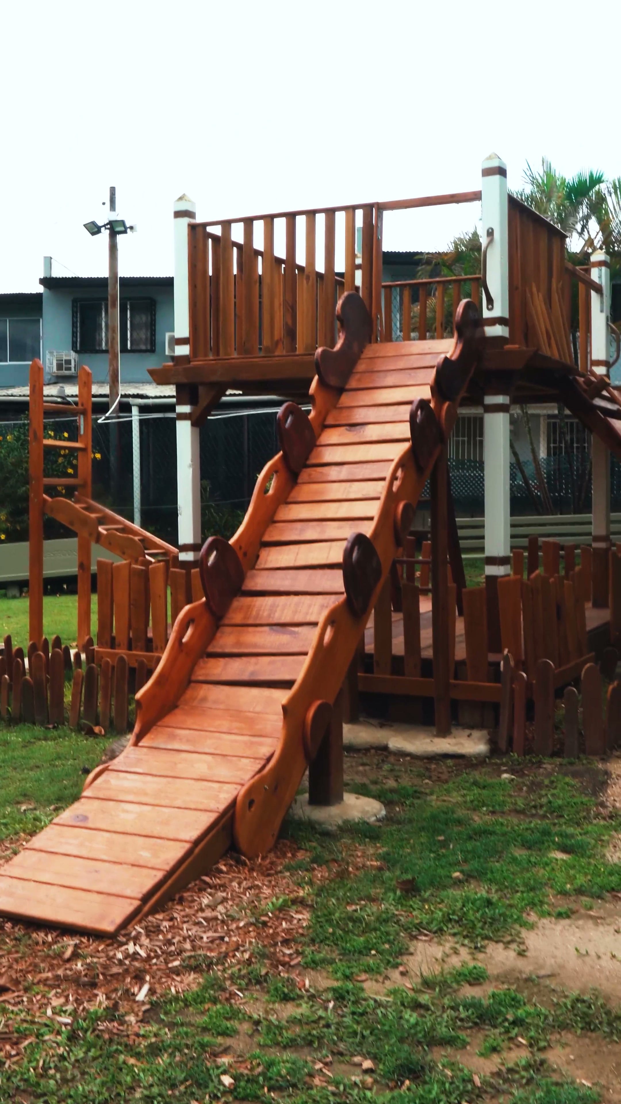 A wooden playground designed by Jerry Perry Designs